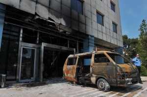 A security officer stands by the mini-va