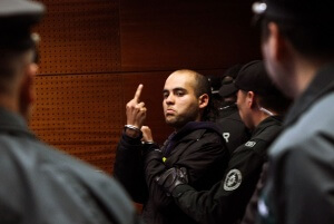 Santiago 18 de septiembre 2014 (UPI). En el Centro de Justicia se realiza el control de detención de Natalie Casanova Muñoz (26), Juan Flores Riquelme (22), y Guillermo Durán Méndez (25), detenidos por su presunta responsabilidad en la colocación de artefactos explosivos en la estación del metro Los Dominicos y en el Subcentro Las Condes. (UPI/Oscar Ordenes)